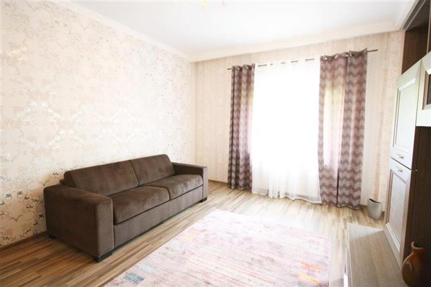 Apartament central cu acces la gradina si 2 locuri parcare
