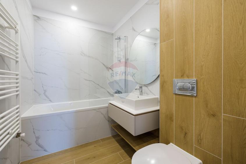 Apartament 2 camere în Urban Plaza. Vedere spre parc. Mobilat complet.