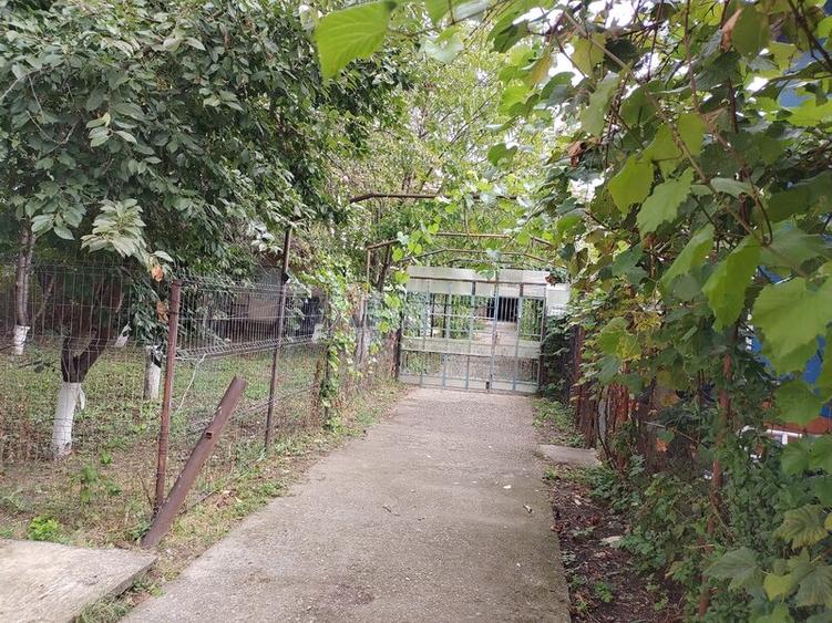 Casa 4 camere -pozitionare centrala, garaj si utilitati