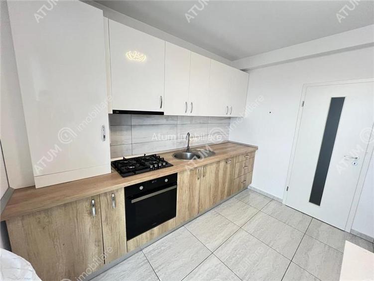 Apartament 2 camere balcon pod generos parcare zona Calea Cisnadiei - 11