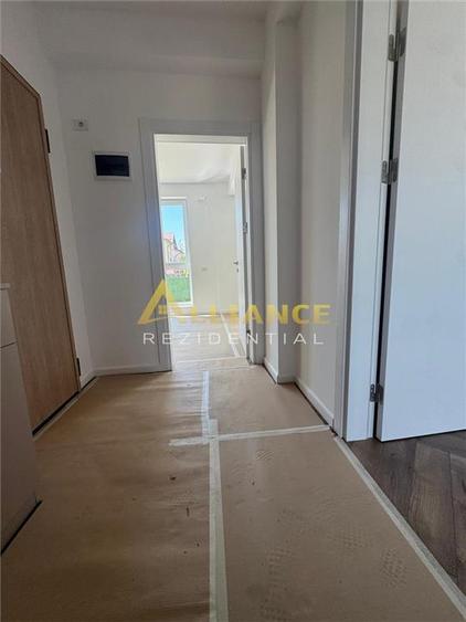 Apartament 2 camere tip Studio + 75 mp curte proprie