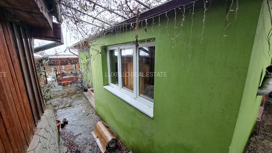 TEREN CU CASA DEMOLABILA - 51