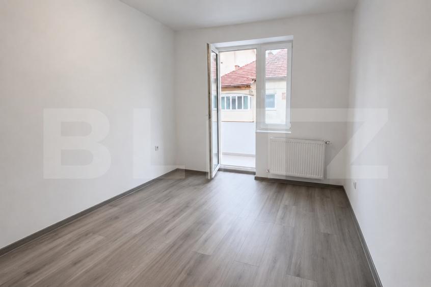 Apartament 3 camere,2 balcoane,pod,pivnita,parcare,etaj 2,zona Joagar