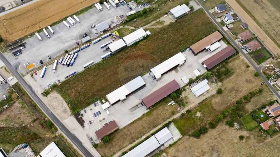 Proprietate industrială 5 hale, teren 21,105 mp, Santion,