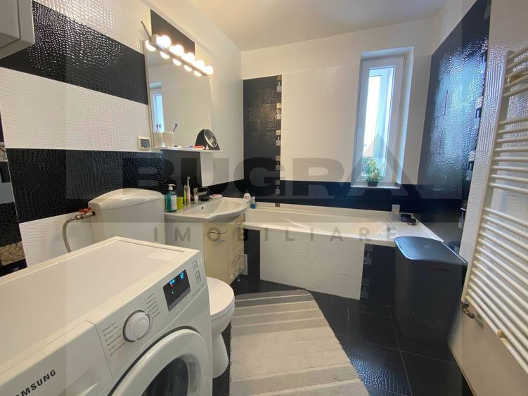 Apartament elegant de 3 camere,65m curte privată, zona Primariei Baciu