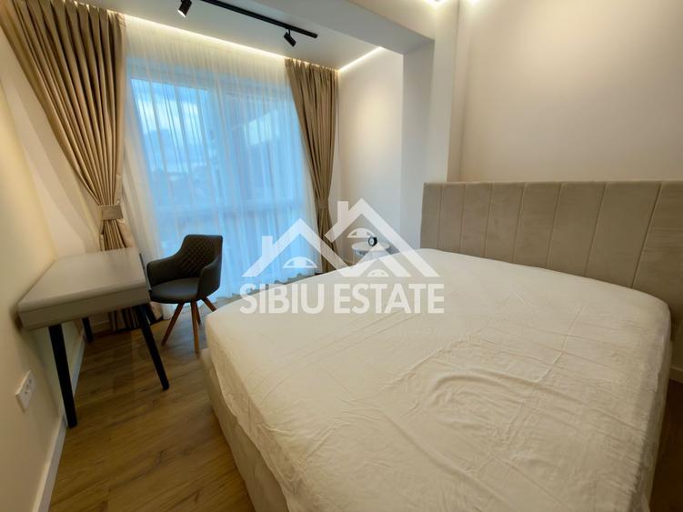 Apartament central finisare premium parcare subterana imobil nou