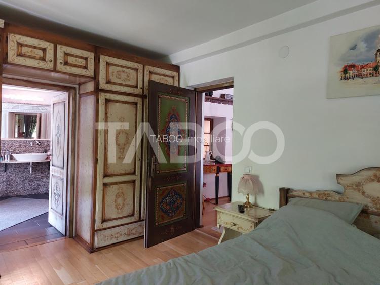 Casa saseasca P+1E+M 216 mpu curte libera 175 mp Cisnadioara - 12