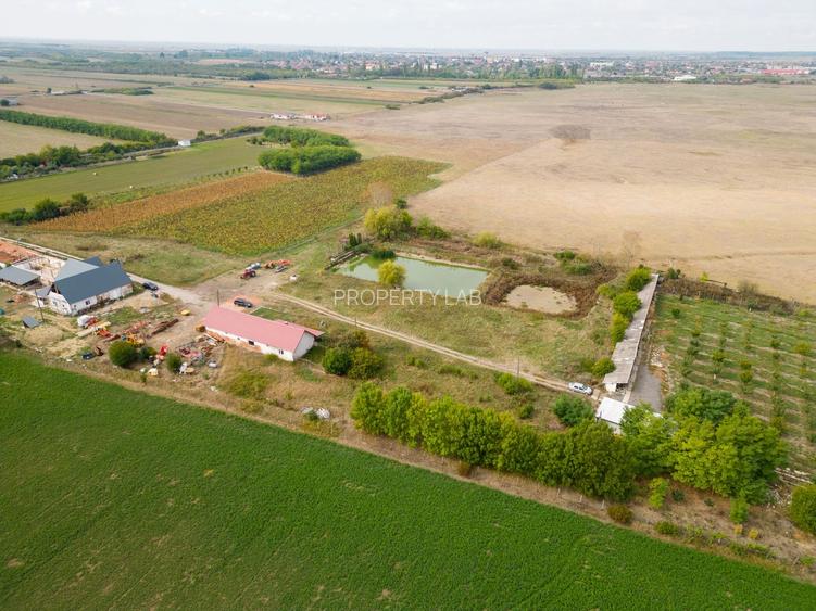 Casă cu teren 13 418 mp intravilan