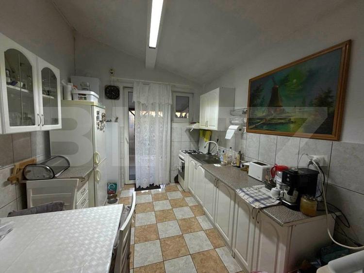Casă spațioasă cu 2 corpuri , 300 mp– ideală pentru 2 familii – teren 776 mp