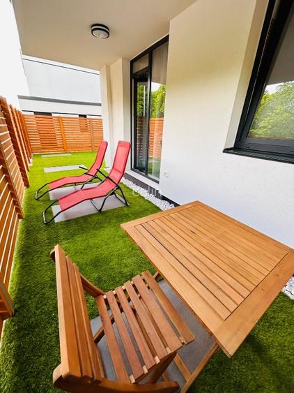Închiriez apartament 2 camere, cu gradina amenajată in bloc nou.