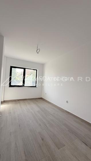 Apartament 3 camere, 2 bai, finisat, bloc nou.
