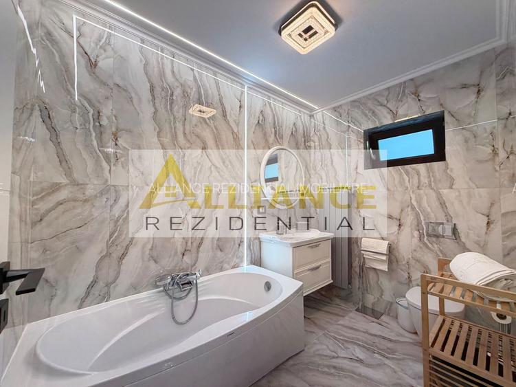 Casa P+1+M cu teren de 650 mp, piscina si curte complet amenajata