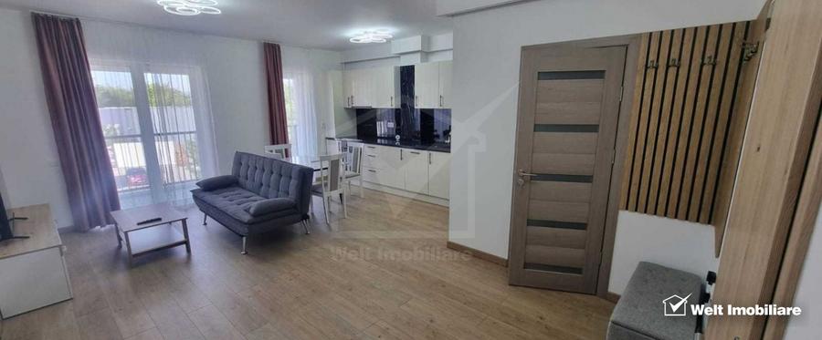 Apartament 2 camere balcon si parcare , la intrare in Floresti