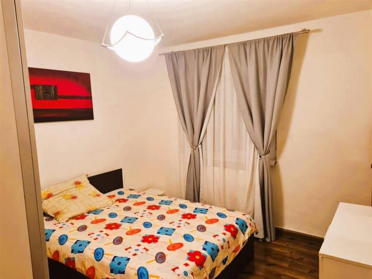 Apartament 2 camere decomandat, etaj intermediar, centrala proprie. Zona racadau