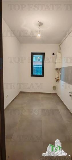 Apartament generos de 3 camere si curte proprie de 115mp, incalzire in pardoseal