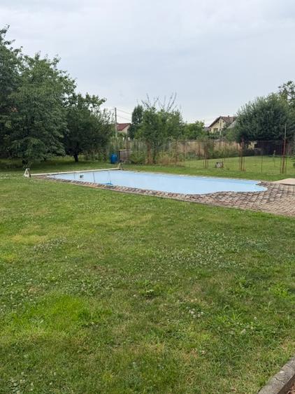 Casa deosebita cu piscina si teren generos