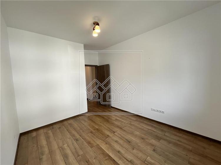 Apartament cu 3 camere, 56,6 mp utili, balcon de 7 mp - Calea Cisnadiei