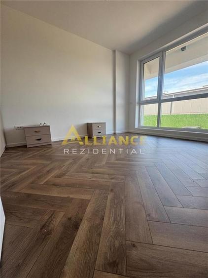Apartament 2 camere tip Studio + 75 mp curte proprie