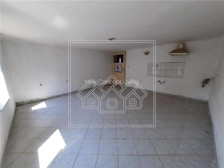 Casa in centrul Cisnadioarei - teren 1177 mp - ideal investitie - 9
