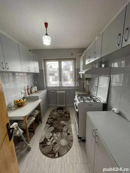 Apartament cu 3 camere , etaj 1/4, zona Podu Ros - 4