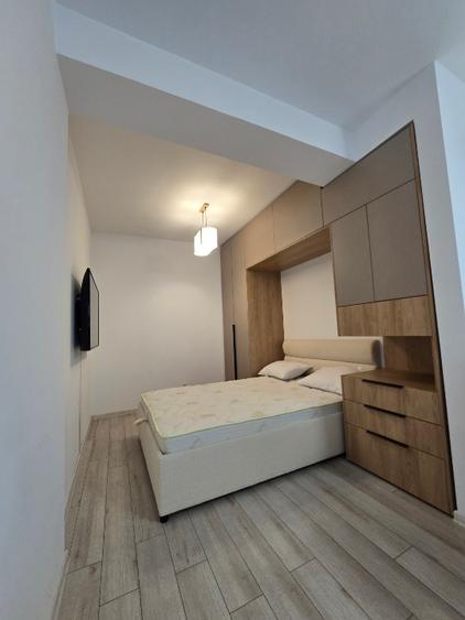 APARTAMENT TIP STUDIO 2 CAMERE MOBILIAT SI UTILAT CU GRADINA PROPRIE
