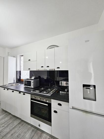 Apartament 2 camere + pod amenajat, in folosinta exclusiva.