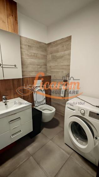 Apartament 2 camere,decomandat,bloc NOU,zona Judetean,mobilat,utilat - 9