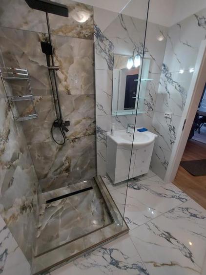 Apartament cu 3 camere,etaj intermediar,parcare subterana,zona Cetatii