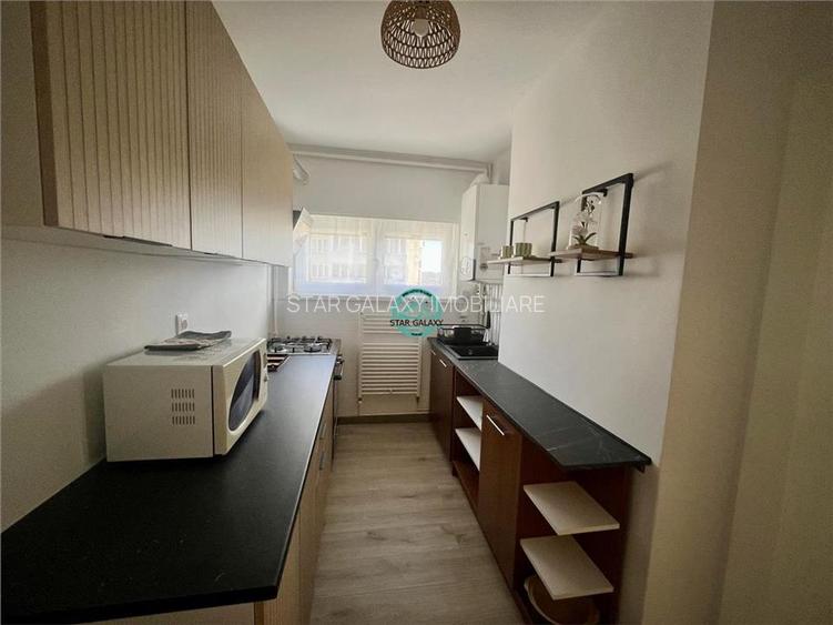 Apartament cu 2 camere mobilat si utilat, situat semicentral