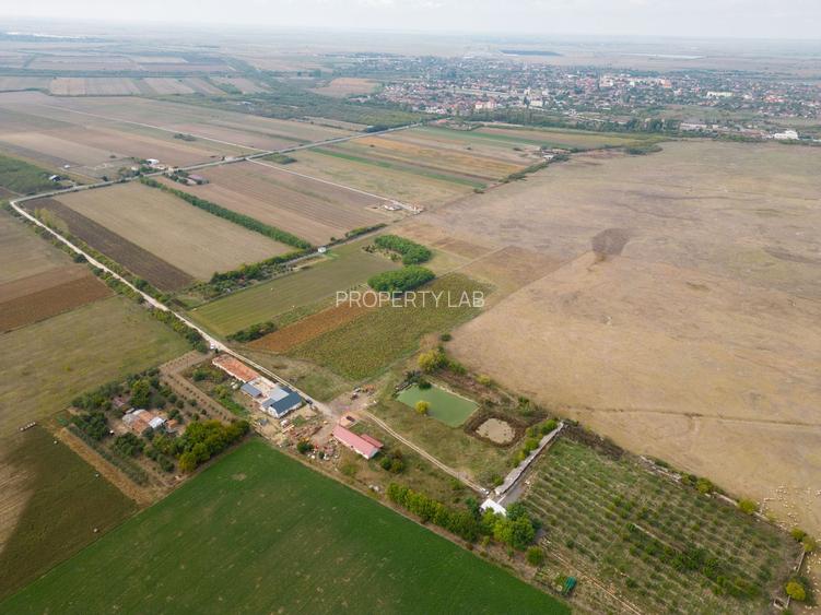 Casă cu teren 13 418 mp intravilan