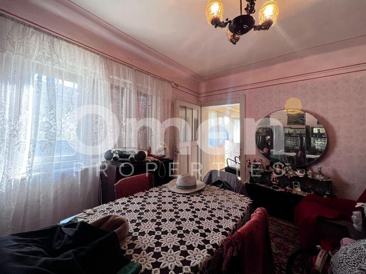 Casă bătrânească | 1500 mp teren, | Tăuții-Măgherăuș.