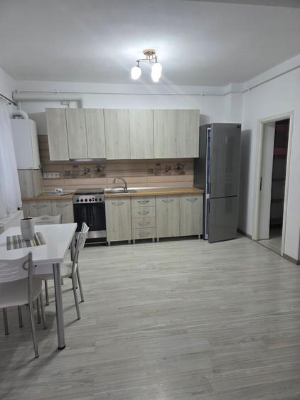 Vand in Unirii,strada Pomilor,apartament cu2 camere,open space,mobilat utilat.