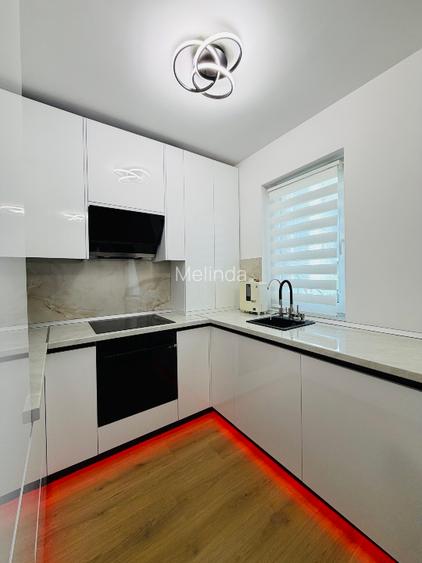Apartament 2 camere + grădină proprie 70 mp + 2 locuri de parcare  - 9
