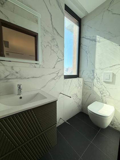 3 camere, 3 bai, 2 dormitoare Master - într-o clădire cu arhitectură deosebită