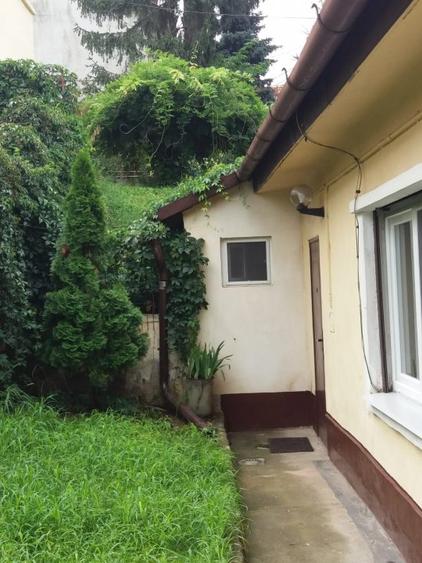 Inchiriez garsoniera la casa ,singur in curte mica