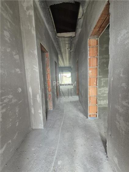 Duplex pe parter - 2 dormitoare - 2 bai - zona in dezvoltare - 13