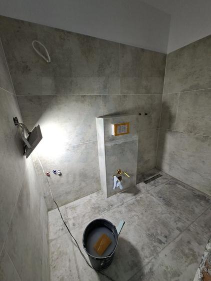 Apartament premium 61.4 mp utili 3 camere 2 bai curte 50 mp Cristian