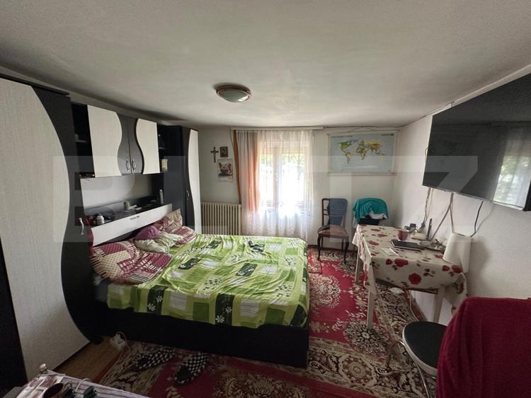 Casă de vânzare, 76 mp utili, teren 1.500 mp, vedere panoramică, zona Bucium