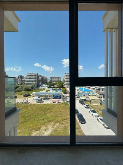 Finalizat | Apartament pe plaja cu vedere la mare în imobil premium
