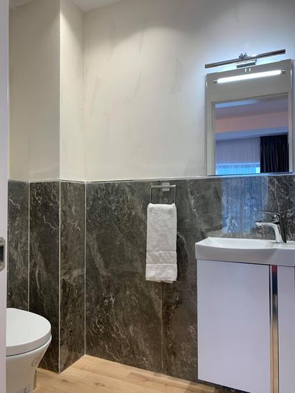 Apartament cu 2 camere, 2 băi și balcon – central, lângă Piața Victoriei