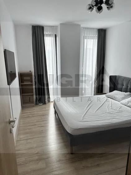 Apartament 2 camere, etaj intermediar, parcare, zona Frunzisului