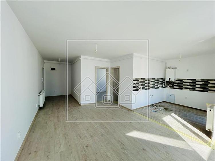 Apartament 2 camere, balcon - Doamna Stanca - nou,finisat la cheie