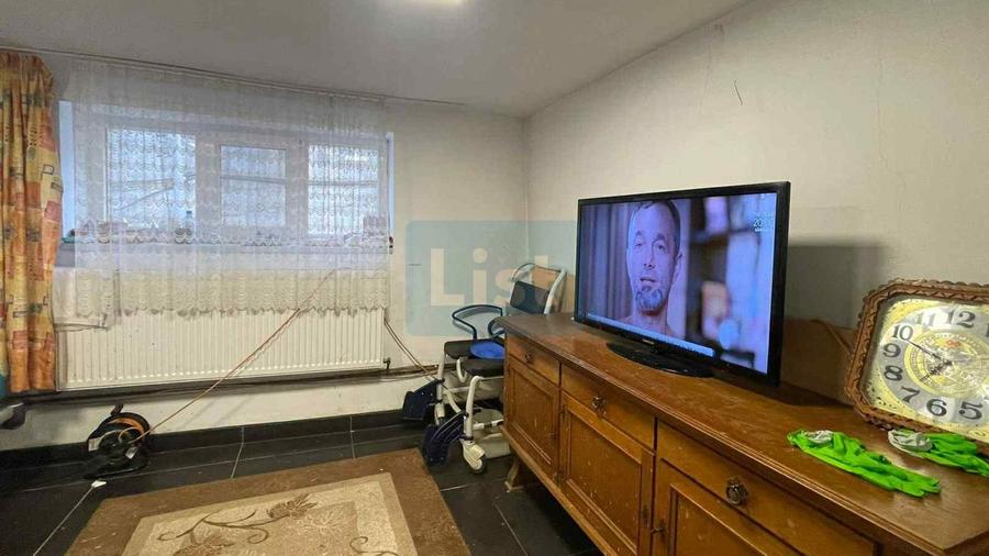 Casa 7 camere, teren 590 mp in Calnic