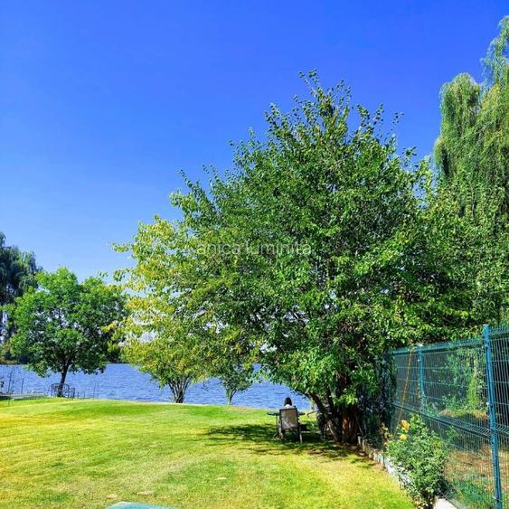 CASA PRESEI OAZA DE LINISTE LAC  APARTAMENT  GRADINA PE LAC LOCATIE UNICA - 2