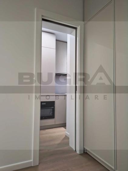 Garsoniera lux, 28mp, balcon, etaj intermediar, parcare, zona centrala