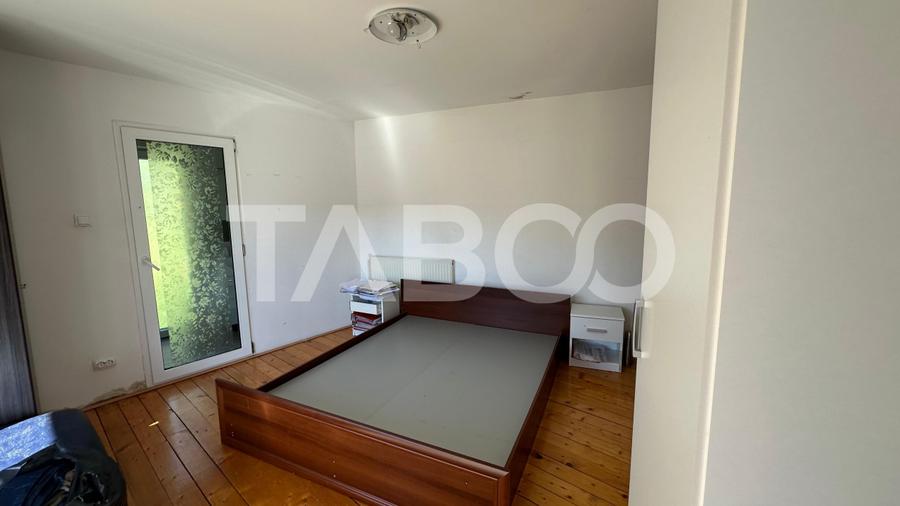Casa din 2 corpuri individuala COMISION 0% curte 900mp in Cisnadioara