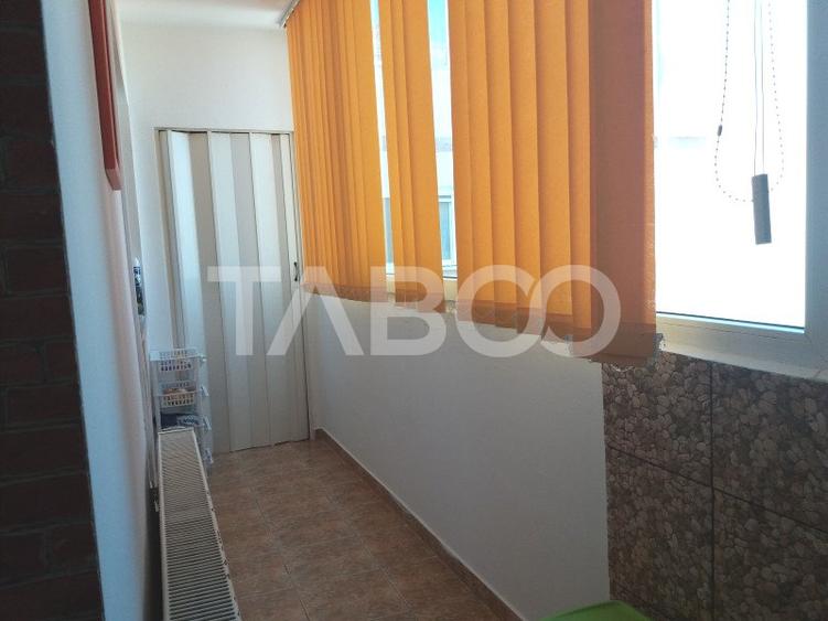 Apartament decomandat 3 camere 2 bai etaj 3 balcon zona buna Cisnadie