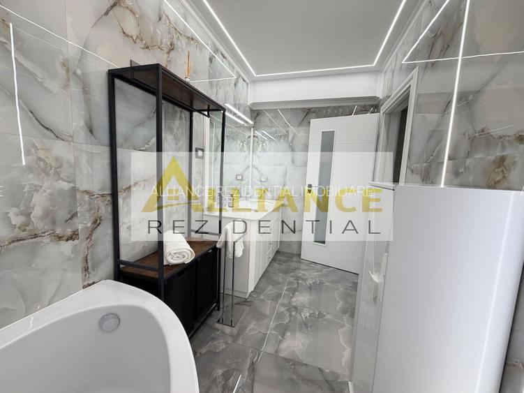 Casa P+1+M cu teren de 650 mp, piscina si curte complet amenajata