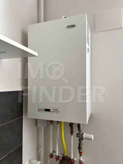 Spatiu amenajat ca locuire, 57 mp, demisol luminos, garaj inclus în Bună Ziua