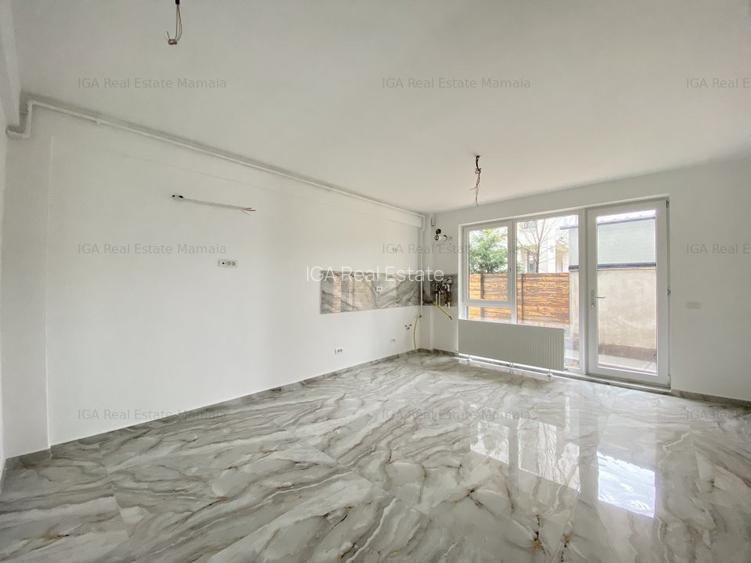Apartament si curte in imobil finalizat aproape de plajă - 4
